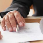 negocio firman un contrato 1 150x150 - American Language Academy celebra sus 50 años